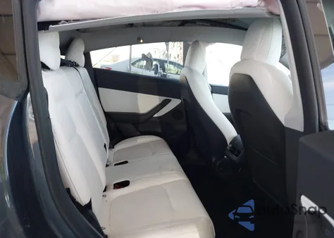 2022 Tesla Model Y Performance Dual Motor All-Wheel Drive z USA, uszkodzony, nr VIN 7SAYGDEF9NF511687